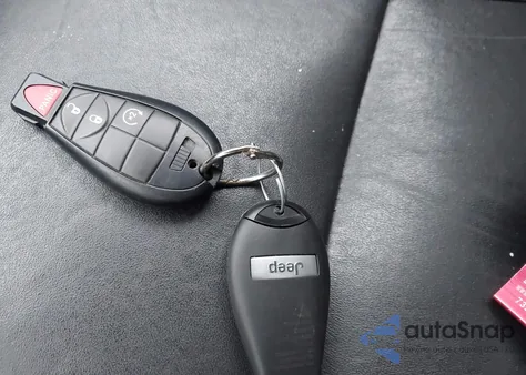 2012 Jeep Grand Cherokee Laredo из США, поврежденный, VIN 1C4RJFAG1CC220575